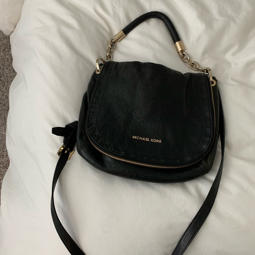 Great leather saddlebag crossbody style. Hardware shows some sign of wear.